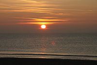 De zon , de zee , het strand