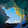 Entrance to ice cave under a glacier in Iceland by Anton de Zeeuw
