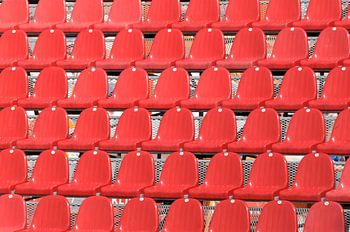 Red chairs on a grandstand