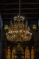 dark church and a golden chandelier