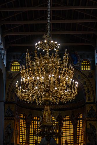 dark church and a golden chandelier