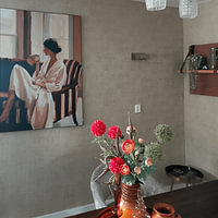 Klantfoto: Rustige vrouw met kop koffie in warm ochtendlicht van But First Framing, als ArtFrame