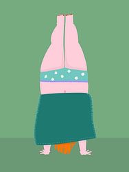 Woman does handstand with dress on