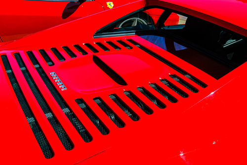 Detail on a red Ferrari F355 sports car