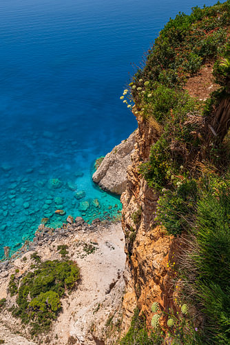View from cliffs to the crystal clear, deep blue Mediterranean Sea