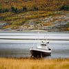 Fishing life in Norway, Norwegian fishing boat at anchor in a fjord by Melissa Peltenburg