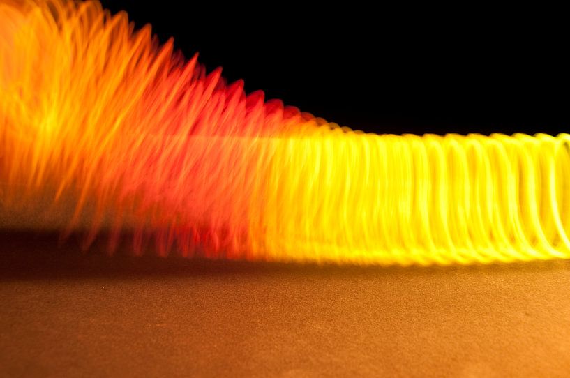 Coloured feather by Ruud Ravensbergen