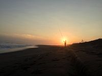 Fisherman on the beach