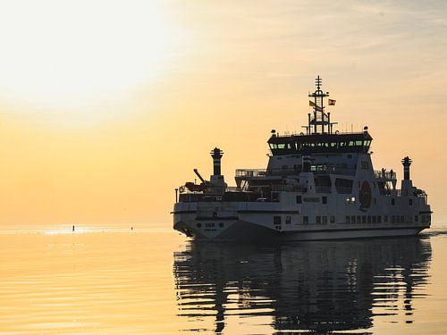 Ship on the water at sunset
