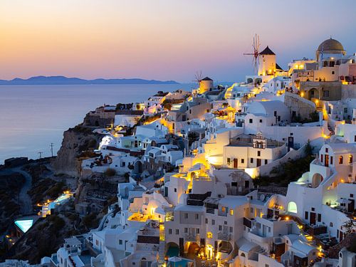 Windmills of Santorini in the glowing evening sky | Travel Photography Greece