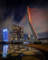The Erasmus Bridge lit up orange