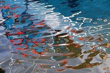 Reflection of a red and white coloured yacht in Urker harbour by Danielle Roeleveld