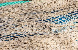 Close-up of fish net pattern, maritime background texture by Alex Winter