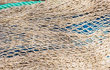 Close-up of fish net pattern, maritime background texture by Alex Winter