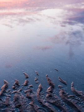 Untergehende Sonne bei steigendem Wasser von Laura-anne Grimbergen