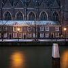 De Pottenkade in Dordrecht in de sneeuw van Raoul Baart