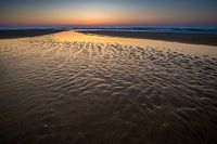 sandy landscape at sunset