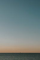View of the horizon during golden hour Ibiza, sailboat