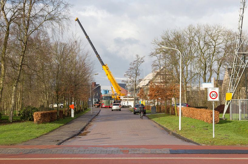 House building at construction site by Micha Klootwijk