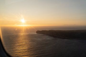 Sunset from plane by Xulé Bogers