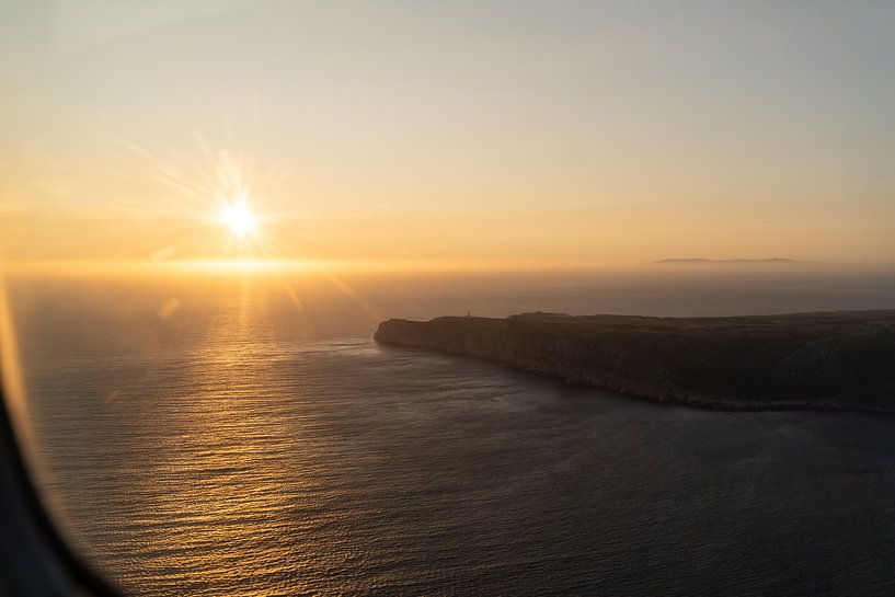 Sunset from plane by Xulé Bogers