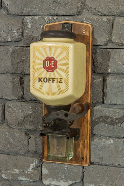 old-fashioned coffee grinder by Lisenka Pauw