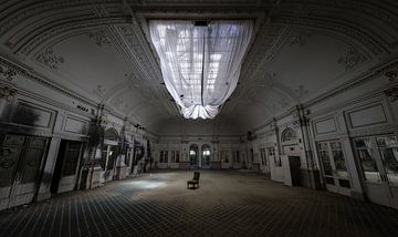 Great hall in abandoned hotel by Inge van den Brande