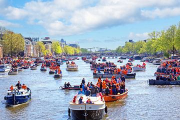 Boating on the Amstel River in Amsterdam on King's Day in Amsterdam Netherlands by Eye on You