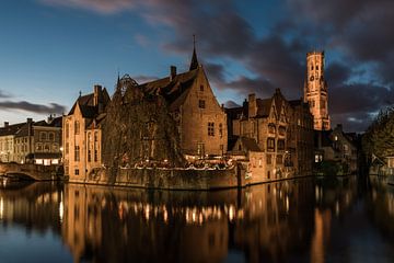 A Bruges classic: the historical Rozenhoedkaai reflecting in the canal