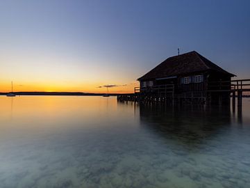 Boathouse in the sunset by Manuel Weiter