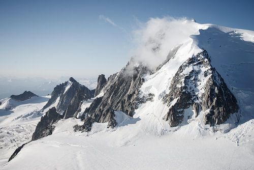 Clouds along mountain peak