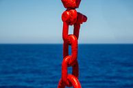 red painted metal chain on boat to Santorini, Greece by Jan Fritz thumbnail