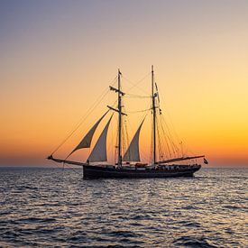 Sailing ship in the sunset at the Hanse Sail in Rostock by Rico Ködder