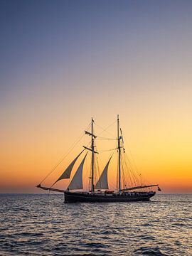 Sailing ship in the sunset at the Hanse Sail in Rostock