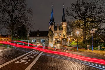 Driving past the Delft East Gate in the evening