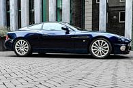 Aston Martin Vanquish sports car parked in front of a modern design shop by Sjoerd van der Wal Photography thumbnail