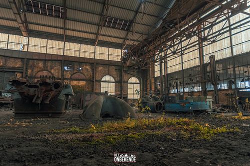 Inside of an abandoned factory hall.
