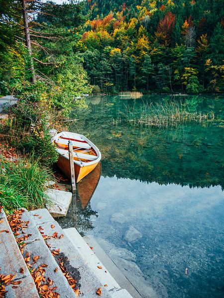 Lake with boat in autumn by Mustafa Kurnaz