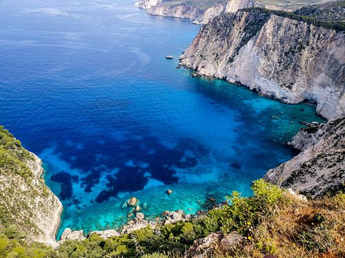 Pale blue water from a cliff - Keri Caves