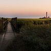 Leuchtturm Westerheversand im Sonnenuntergang von Jens Sessler
