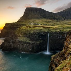 Múlafossur waterfall at sunset by Remco Bosshard