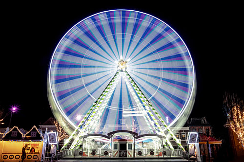 The Ferris wheel at night at the funfair