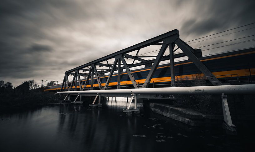 Express train on steel bridge over the river Rotterdam by Arthur Scheltes